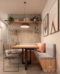 a dining room with a table and chairs next to a shelf filled with potted plants