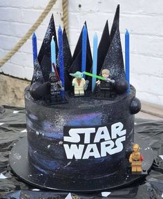 a star wars themed cake with legos on top