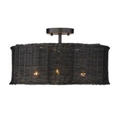 a light fixture with wicker shades on the bottom and two lights in the middle