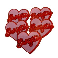 three heart shaped patches with the words brother and sister in red on pink, set against a white background