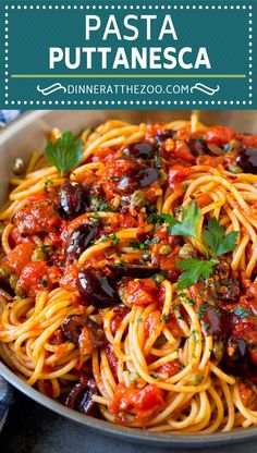 pasta with sauce and olives in a pan