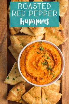 roasted red pepper hummus in a bowl surrounded by pita chips