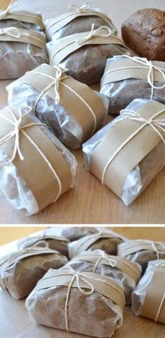 there are many rolls wrapped in brown paper