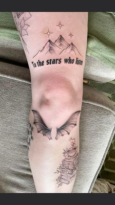 a woman's leg with tattoos on it and the words to the stars who listen