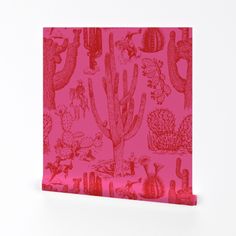 a pink greeting card with cactus and cacti printed on the front in red ink