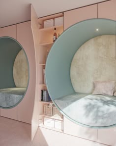 two circular mirrors are shown in the shape of a couch and bookcase, with bookshelves behind them