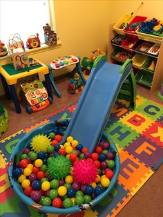 a child's play room with toys and games