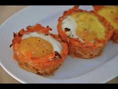 two eggs are sitting on top of some kind of food