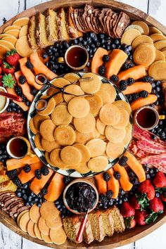 a platter filled with lots of different types of food