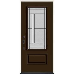 a black front door with glass panels on the side and an iron handle in the middle