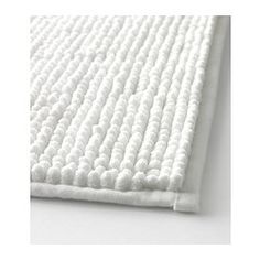 a white rug on top of a table