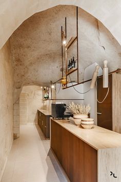 a kitchen area with wooden cabinets and counter tops