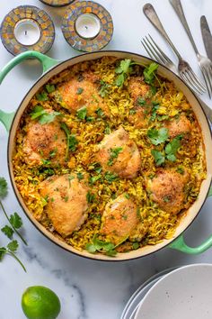 chicken and rice casserole with cilantro garnish on the side