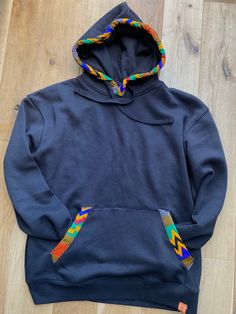 This soft and comfortable unisex hoodie is perfect for both those lazy stay at home days and also layering when going out. We have these in several Red, Navy, Faischia, Bottle Green and Heather Grey. If you can't find the colour and size you are looking for, just drop us a message. Materials: 20% polyester 80% combed cotton 100% african print cotton Size guide: XS Chest 34/36 S Chest 36/38 M Chest 38/40 L Chest 40/42 XL Chest 42/44 XXL Chest 44/46 XXXL Chest 46/48 African Print Hoodie, Sewing Room Design, Hoodie Outfit, Bottle Green, Print Hoodie, African Print, Combed Cotton, Hoodie Print, Ankara