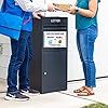 two people standing next to each other near a trash can