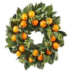 an orange wreath with green leaves and berries