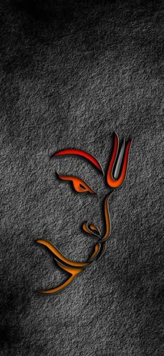 an orange and black logo on a gray background with the word's name in arabic