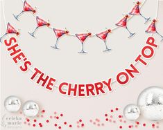 there is a banner that says she's the cherry on top with martini glasses