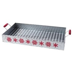 a metal tray with red snowflakes and checkered tablecloth on the bottom