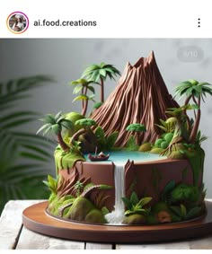 a cake that is decorated with trees and plants