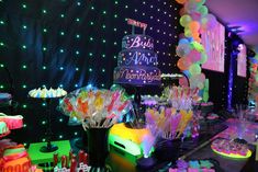 an image of a birthday party setting with cake and candy