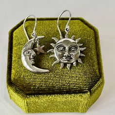 "Celestial Half Moon with dangling star & Sun Dangle Drop Earrings ~ The earrings are SOLID NOT HOLLOW sterling silver.  ERA- 2023 METAL / MATERIAL - Sterling Silver MARKINGS / HISTORY - Earrings are marked 925 CONDITION - New MEASUREMENTS - Earrings: 1 1/2\" x 3/4\"  -Weight (both earrings): 3.42 grams" Celestial Silver Earrings With Star Charm, Celestial Star-shaped Earrings With Sun And Moon Design, Celestial Star Shaped Earrings With Sun And Moon Design, Sun Earring, Sun And Moon Earrings, Star Earring, Celestial Earrings, Indie Jewelry, Retro Accessories