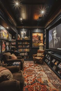 a living room filled with furniture and bookshelves covered in movie memorabilia on the walls