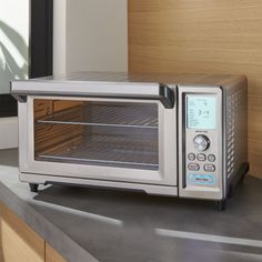 a toaster oven sitting on top of a counter