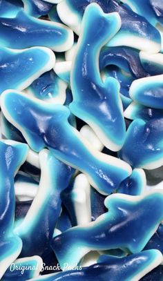 blue and white candies are piled together