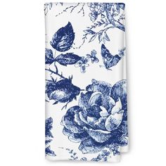 a blue and white floral print towel on a white background, with butterflies flying over it