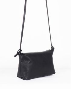 Small black leather crossbody bag, minimalist small purse, Handmade small leather bag, black small purse women, small shoulder bag The Harmony collection is designed looking for the perfect fusion between Beauty and Functionality. With highly studied patterns, the leather accessories in this collection breathe Harmony and minimalism. The small shoulder bag is designed to comfortably carry what you need. This small leather cross body bag is handmade by Mon in the small atelier Nubuckcuir Handmade Minimalist Evening Shoulder Bag With Adjustable Strap, Minimalist Rectangular Shoulder Bag With Leather Lining, Black Leather Lined Crossbody Shoulder Bag, Black Leather-lined Crossbody Shoulder Bag, Minimalist Clutch Shoulder Bag With Detachable Strap, Minimalist Satchel Shoulder Bag With Leather Lining, Minimalist Leather-lined Satchel Shoulder Bag, Minimalist Crossbody Shoulder Bag With Adjustable Strap, Minimalist Black Shoulder Bag With Adjustable Strap