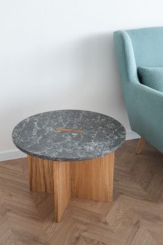 A round stone and oak coffee table blending Scandinavian, boho, and Art Deco influences. The smooth stone tabletop features a mesmerizing marble and concrete mosaic, adding a touch of light and artistry. Crafted from solid oak, the sturdy base enhances the table's natural appeal. #Scandinavian #Boho #CoffeeTable #RoundStone #Marble #Concrete #Light #ArtDeco #Oak" Small Round Side Table, Stone Furniture, Top Highlights, Stone Table Top, Stone Table, Table Coffee, Round Side Table, Wood Stone, Stone Top