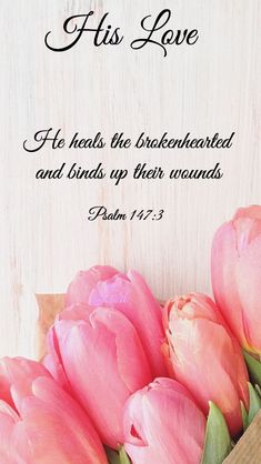 pink tulips in a wooden box with the words, his love he heals the brokenhearted and ends up their vows