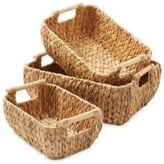 three woven baskets sitting next to each other