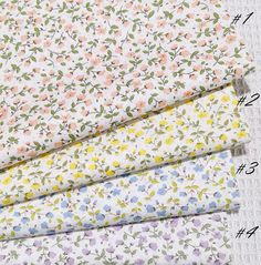 four different types of fabric with flowers on them