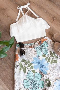 Our Poppy Floral Wide Leg Pants are ideal for adding a fun and colorful touch to your look this summer. Perfect for the beach or everyday wear, they'll keep you both comfortable and stylish! #outfitinspo #ootd #grwm #flatlay #beach #vacationstyle #sunglasses #boutique #shopping #outfit #floralpant Back Light, Vacation Style, Floral Pants, Beach Outfit, Leg Pants, This Summer, Wide Leg Pants, Poppies, The Beach