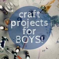 the words craft projects for boys written in white on a blue circle surrounded by paints and brushes