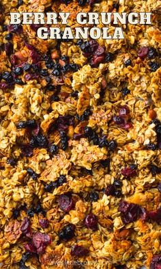 a close up of granola on a plate with the words berry crunch granola above it