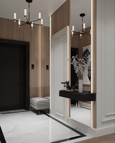 an elegant bathroom with black and white accents, marble flooring and chandelier