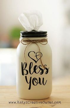 a mason jar with a tissue dispenser on it that says, i love you