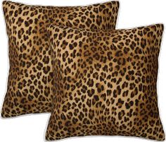 two leopard print pillows sitting next to each other