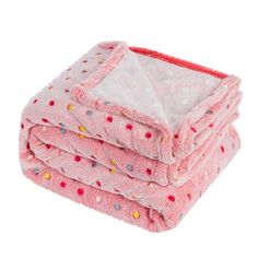 three pink blankets stacked on top of each other with polka dot print and red trim