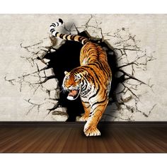 a large tiger walking through a hole in the wall