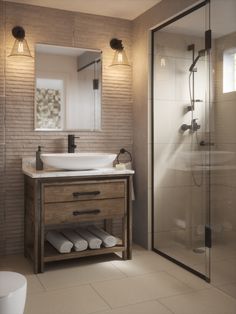 a bathroom with a sink, mirror and shower stall