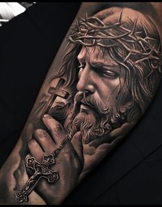 Mens Religious Tattoos, Shoulder Tattoo Men Greek Mythology, Jesus Sleeve Tattoo Men, Jesus Tattoos Men, Jesus Sleeve Tattoos For Women, Men’s Around Knee Tattoo, Sleeve Tattoos God, Men’s Tattoo Arm