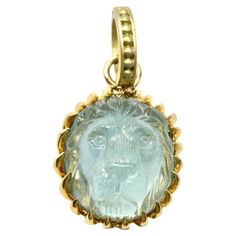 18K aquamarine hand carved lionshead pendant by master Idar Oberstein carver. 15mm Lion Jewelry, Contemporary Necklace, Carved Stone, Aquamarine Stone, Modern Necklaces, Gold Hands, Modern Pendant, Stone Cuts, Stone Carving