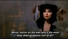 an image of a woman with the words mirror, mirror on the wall who's the most drop dead gorgeous one of all?