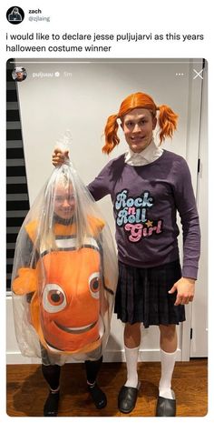 two girls dressed up as nemo and finding nemo from the movie finding nemo