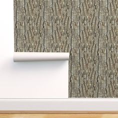 the wallpaper is made up of wood grains and has a white frame on it