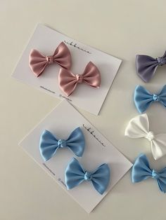 Set of 2 Small Satin Bows for Baby Satin Bow Clip Set Add a touch of cuteness to your hairstyle with this stunning handmade bow hair clip. Crafted from high-quality satin ribbon, this hair accessory is the perfect finishing touch to your look. All our clips are lead tested stainless steel which is nickel free.  ✔️ Dimension / in length    . Bow approximately 5.5 x 4cm     ✔️ Attachment     45mm alligator clip  ✔️ Included / 2 x small satin bows  ✔️ Available in a variety of colours  ⭐️ All products are carefully handmade with love and great attention in Australia. Thank you for visiting and shopping at ribbonie. Small Satin Hair Bow, Small Hair Bows Satin, Satin Hair Clip, Handmade Hair Bow Clips, Ribbon Bow Clip, Cute Clips For Hair, Bow Packaging Ideas, Hair Bow Business, Hair Accessories Ribbon